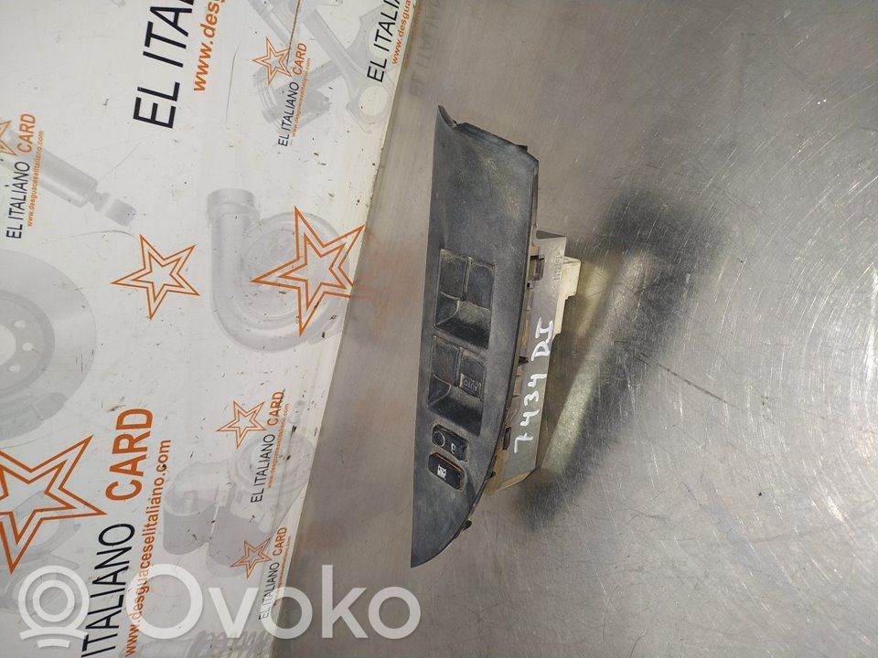 Electric window control switch   7434