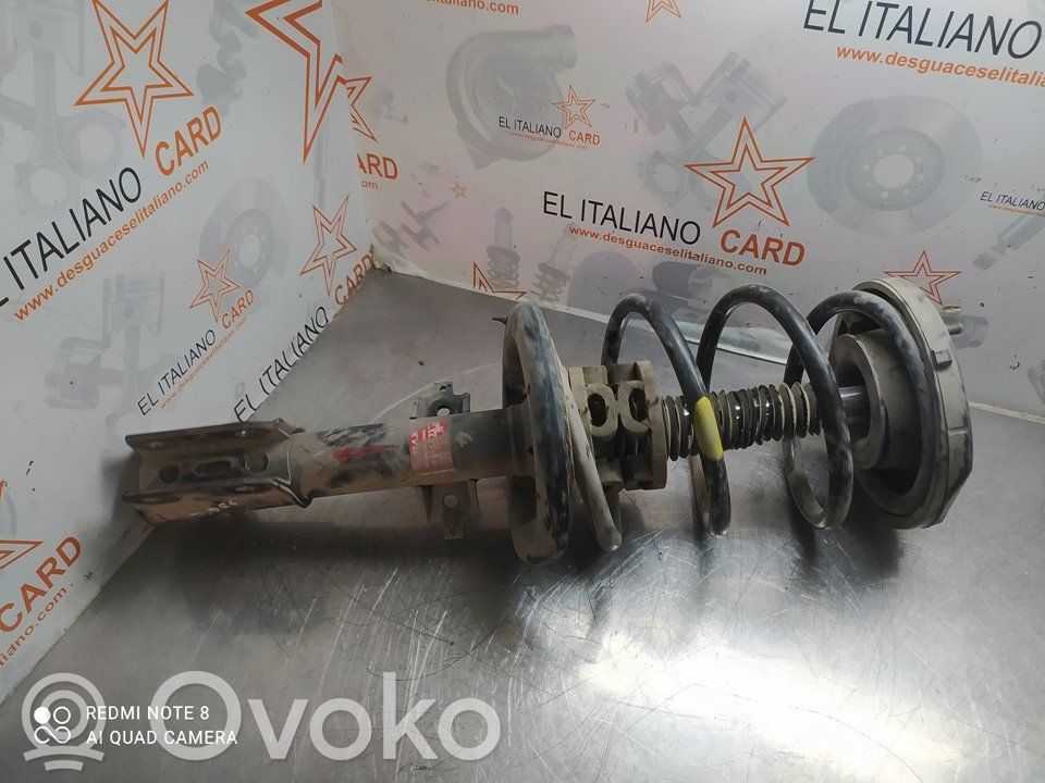 Front shock absorber with coil spring   7469
