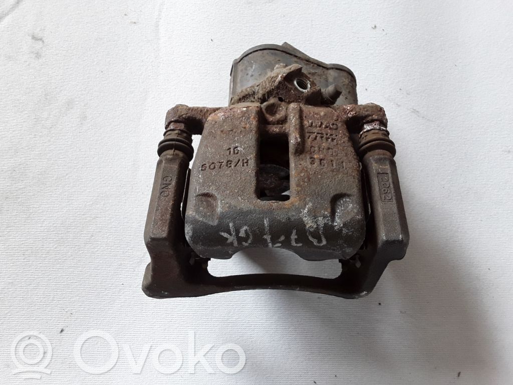 Volkswagen PASSAT B7 Tylny zacisk hamulcowy 