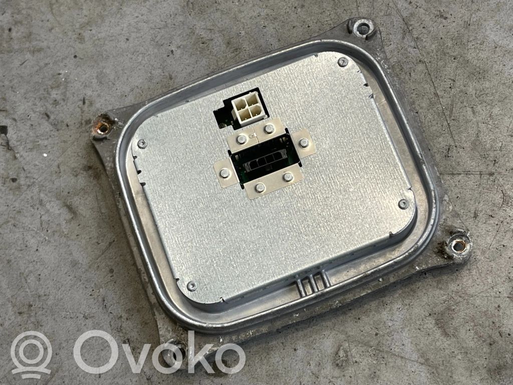 Sterownik / moduł świateł Xenon   1307329153,10EEG071242,301195,63117356250,63127255724,7182520