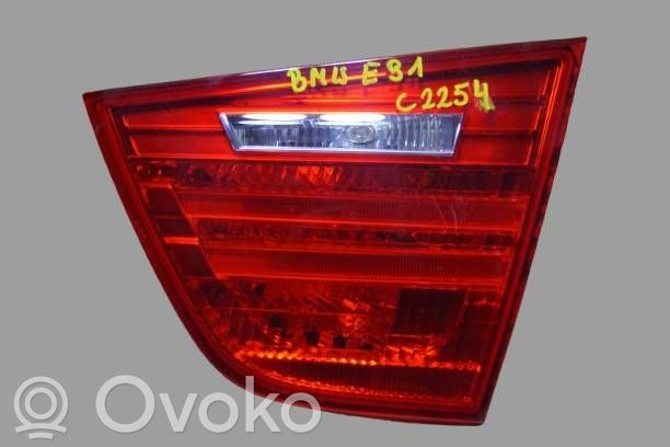 BMW 3 E90 E91 Aizmugurējais lukturis pārsegā 