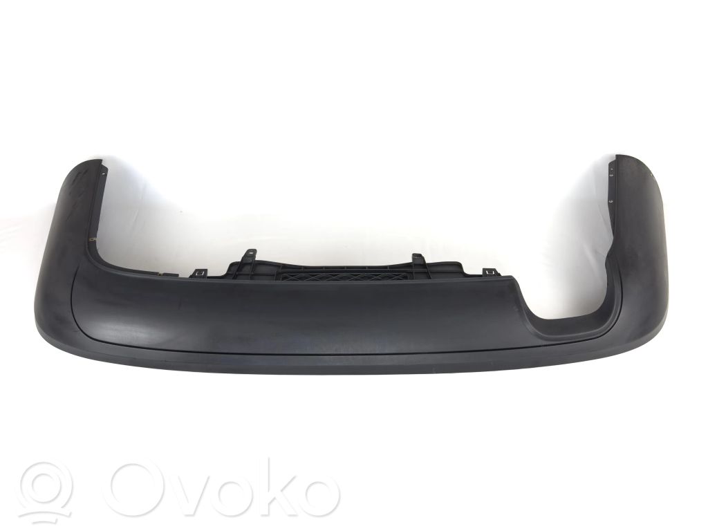 Volkswagen PASSAT B6 Moldura inferior del parachoques trasero 