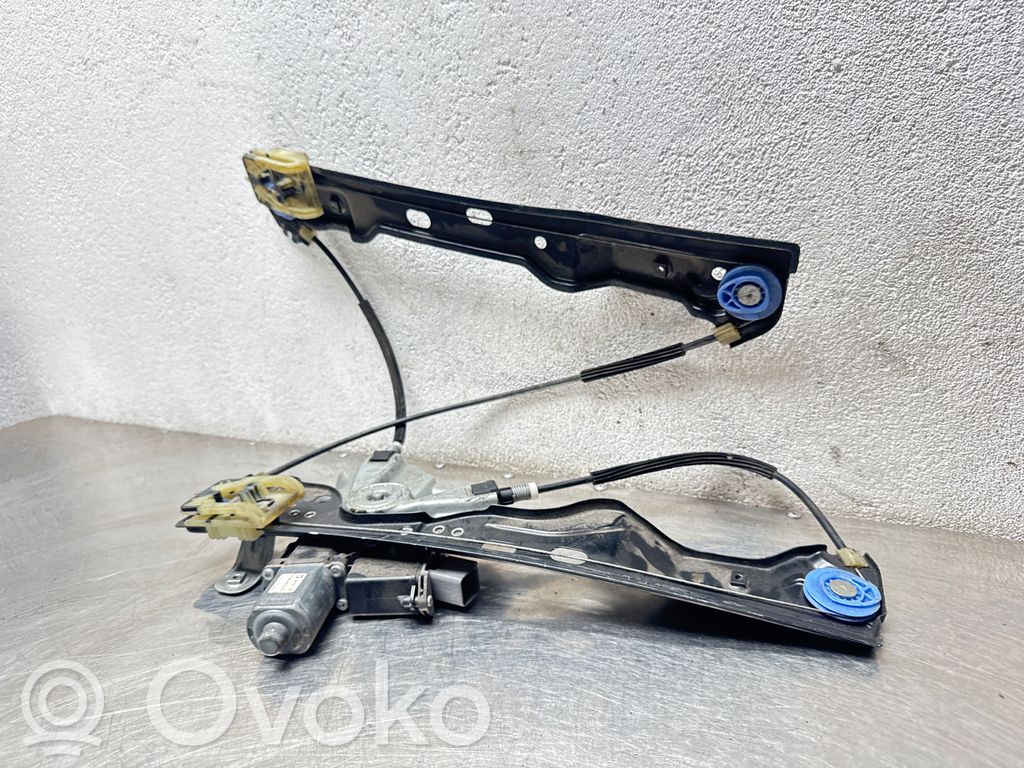 Opel Astra J Elektryczny podnośnik szyby drzwi przednich 