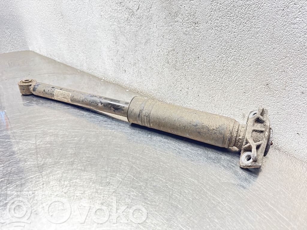 Opel Astra J Aizmugurē amortizators 