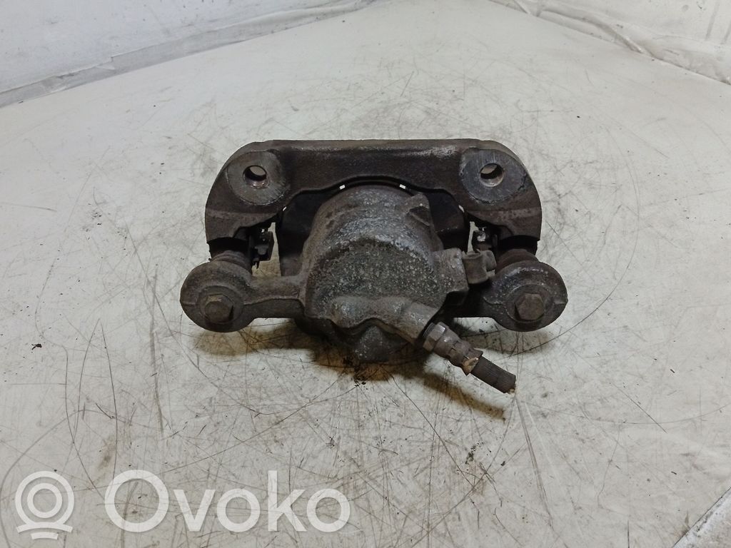 Front brake caliper   3019B16