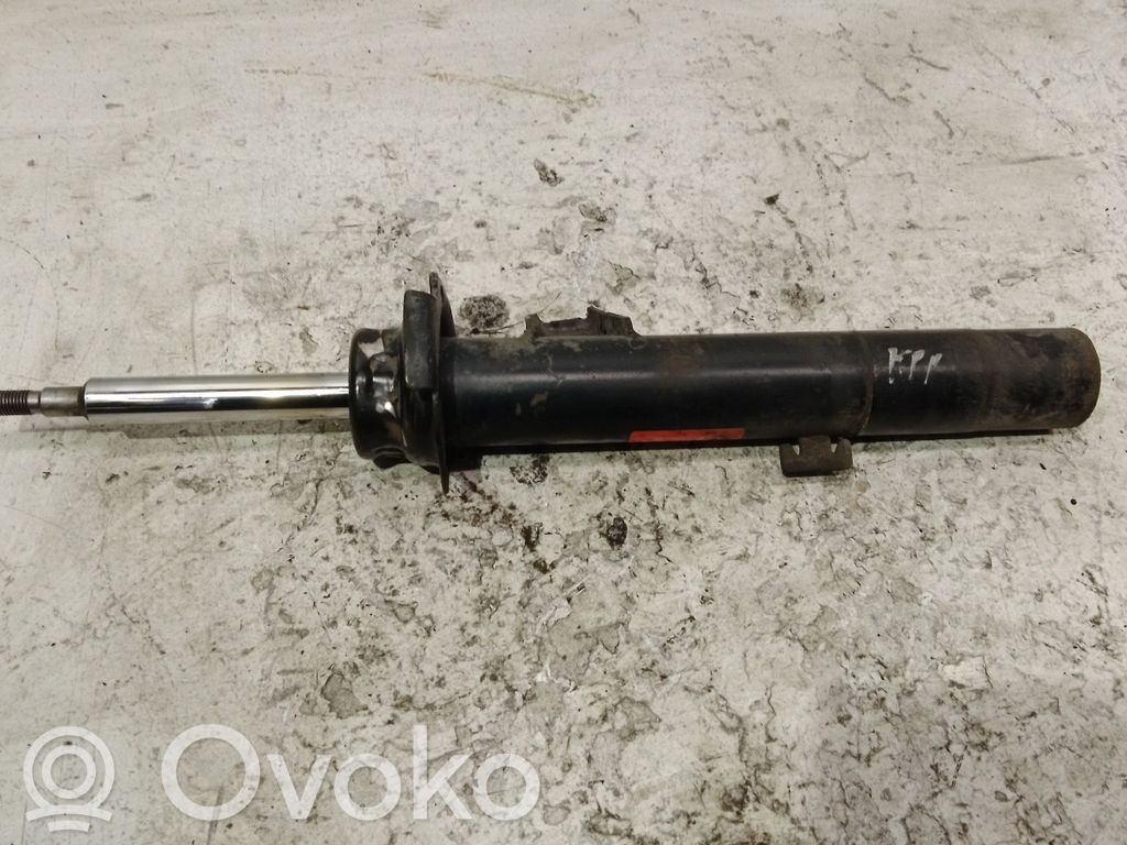 BMW 1 E81 E87 Priekšpusē amortizators 