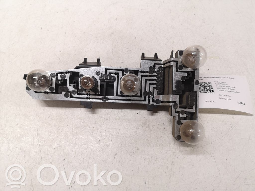 Volkswagen Golf IV Takavalon polttimon suojan pidike 