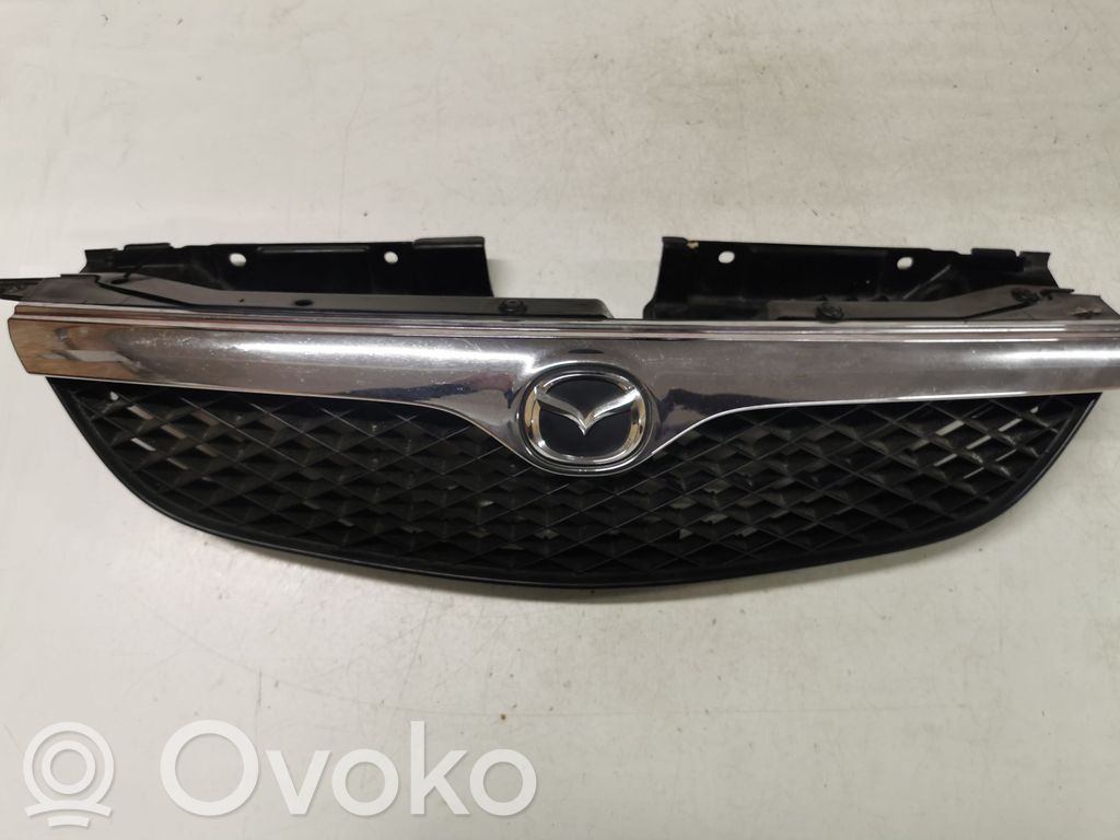 Mazda 626 Front bumper upper radiator grill 