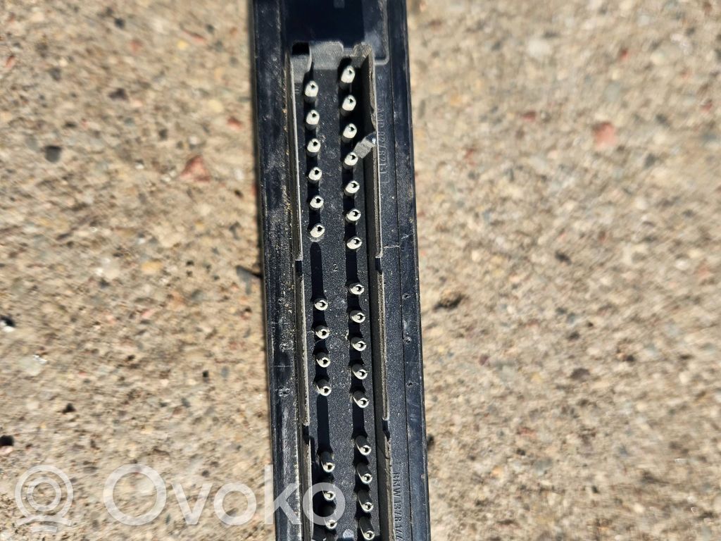 BMW 5 E34 Komforto modulis 