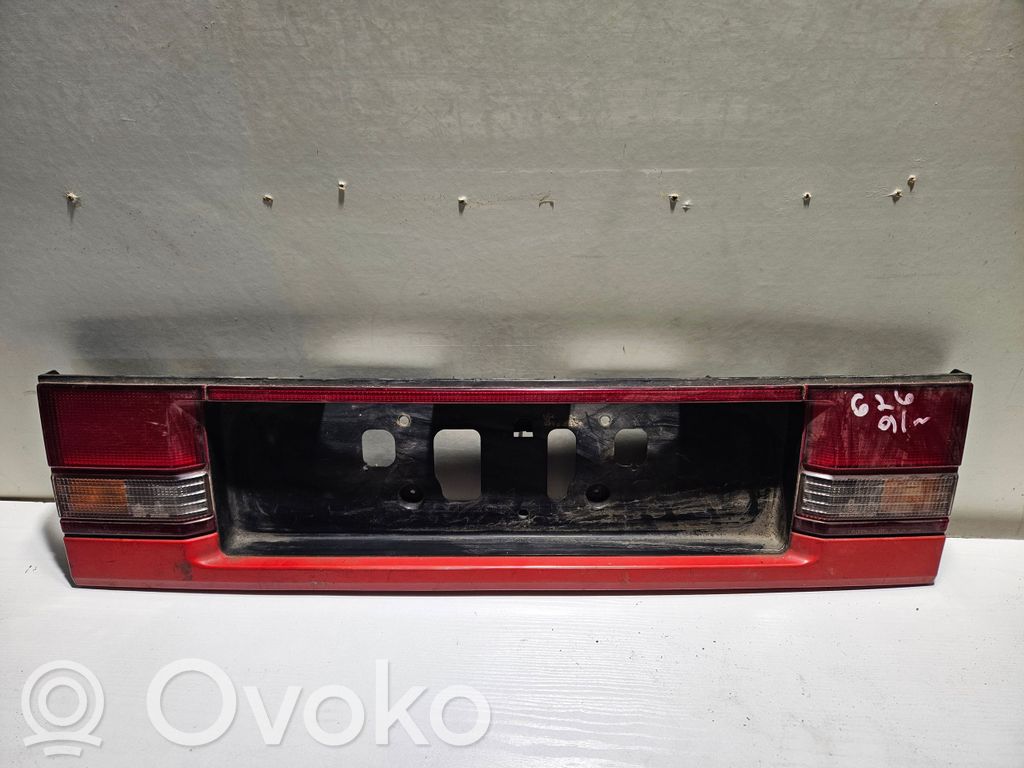 Mazda 626 Rear light center trim bar blend 