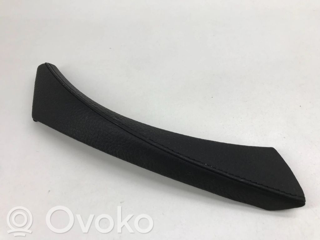 Front door interior handle trim   6964381