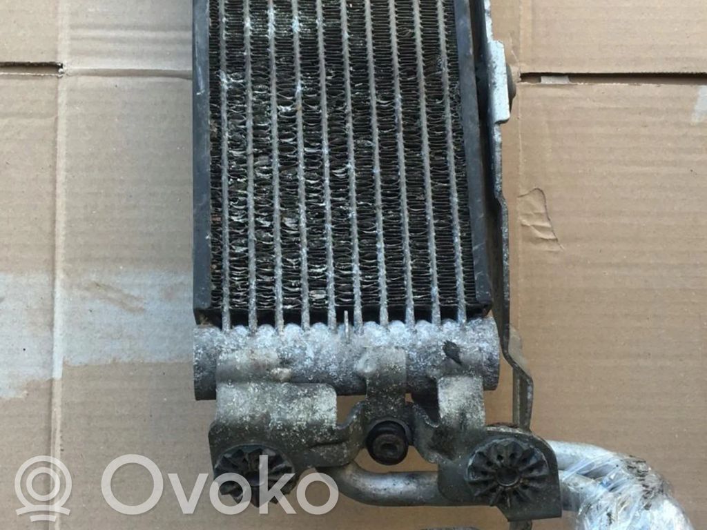Engine oil radiator   7521376