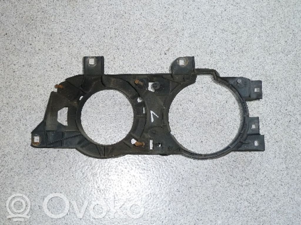 BMW 5 E34 Uchwyt / Mocowanie lampy przedniej 