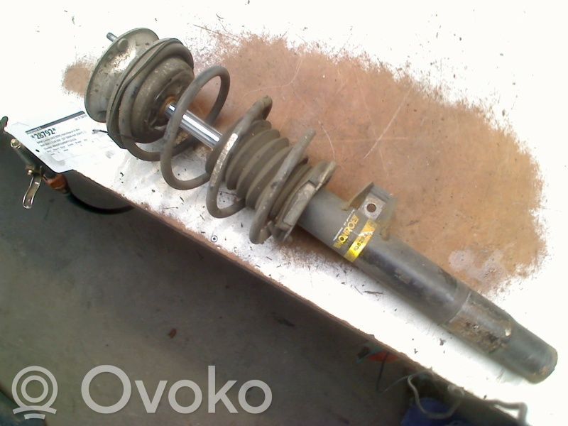 Front shock absorber with coil spring
