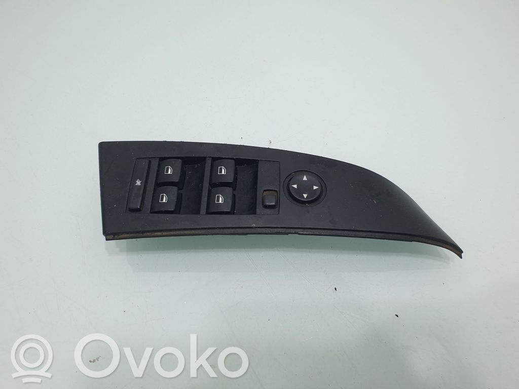 Electric window control switch   6951904