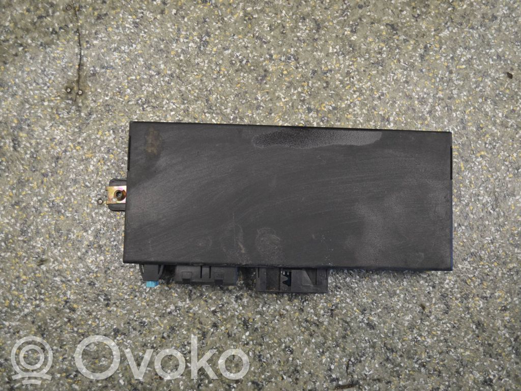 BMW 5 E34 Komforto modulis 