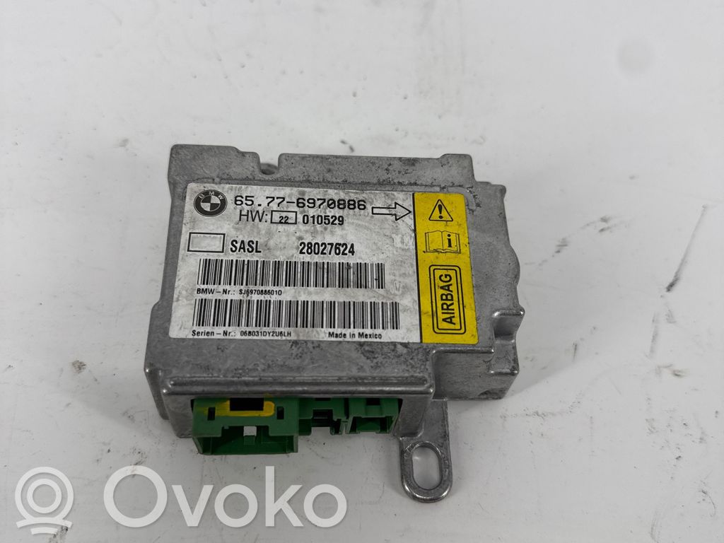Airbag control unit/module   6970886,28027624,E2010529