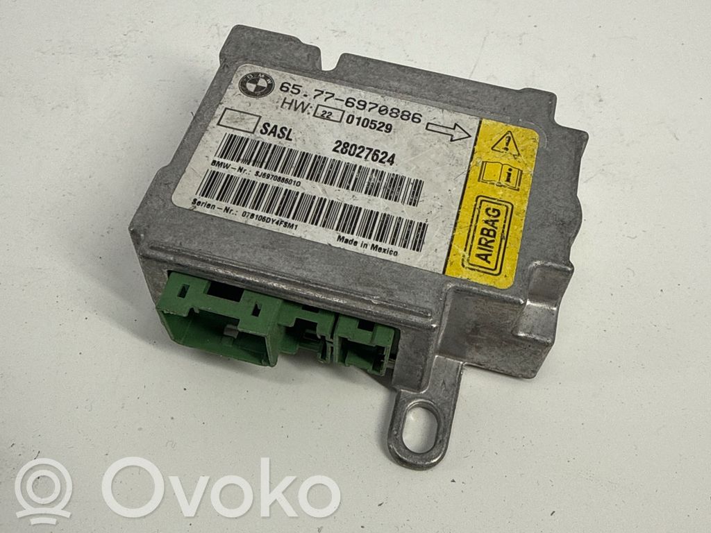 Airbag control unit/module   6970886,28027624,E1010529