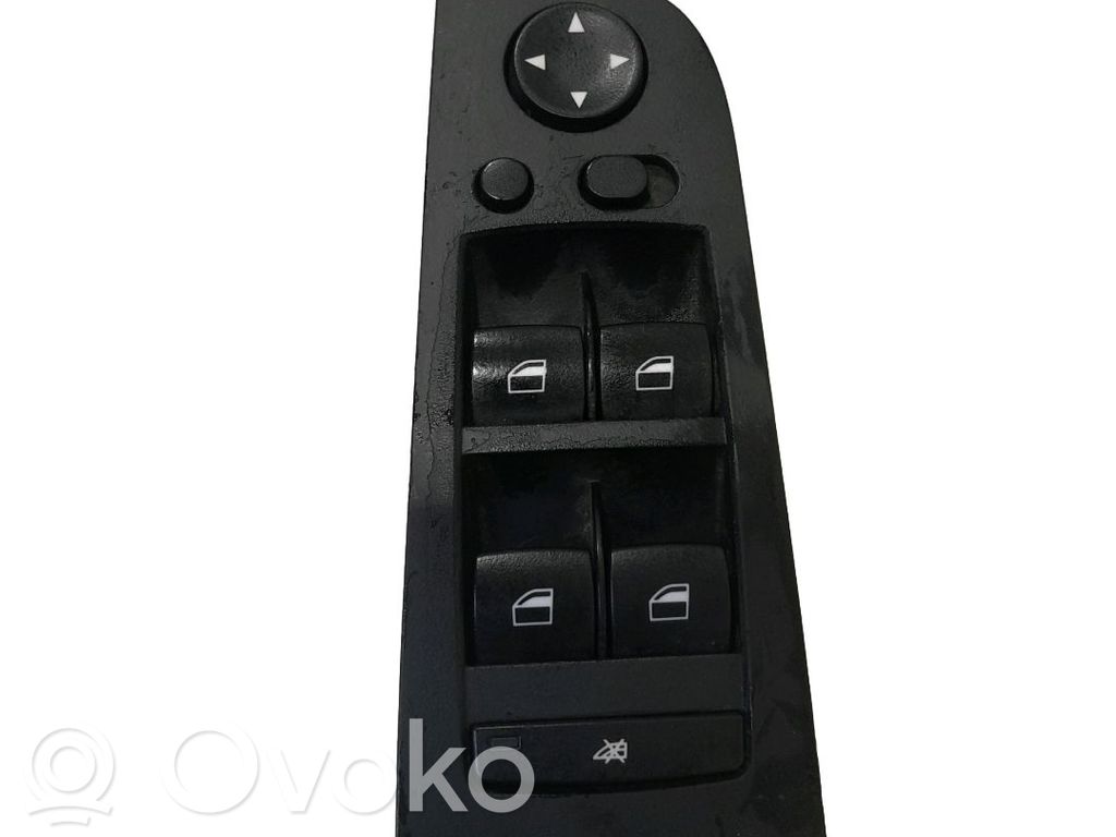 Electric window control switch   6948632