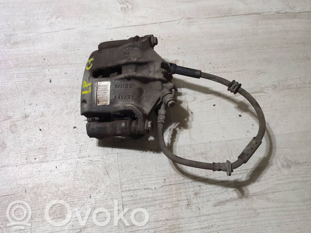 Opel Corsa F Zacisk hamulcowy przedni 
