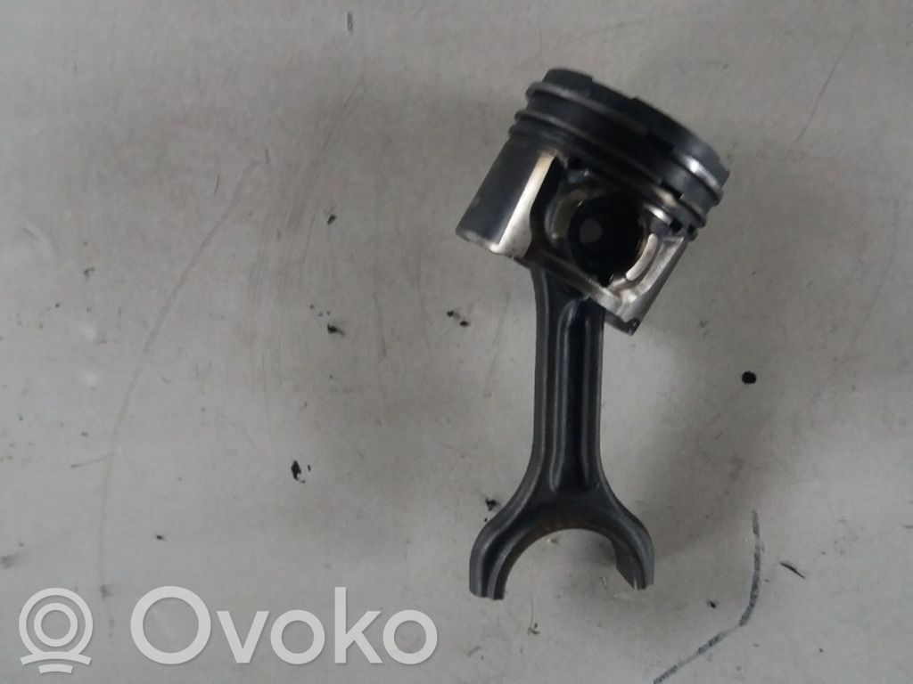 Piston with connecting rod