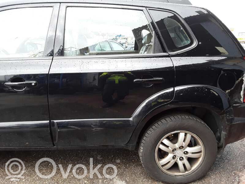 Hyundai Tucson JM Rear door 