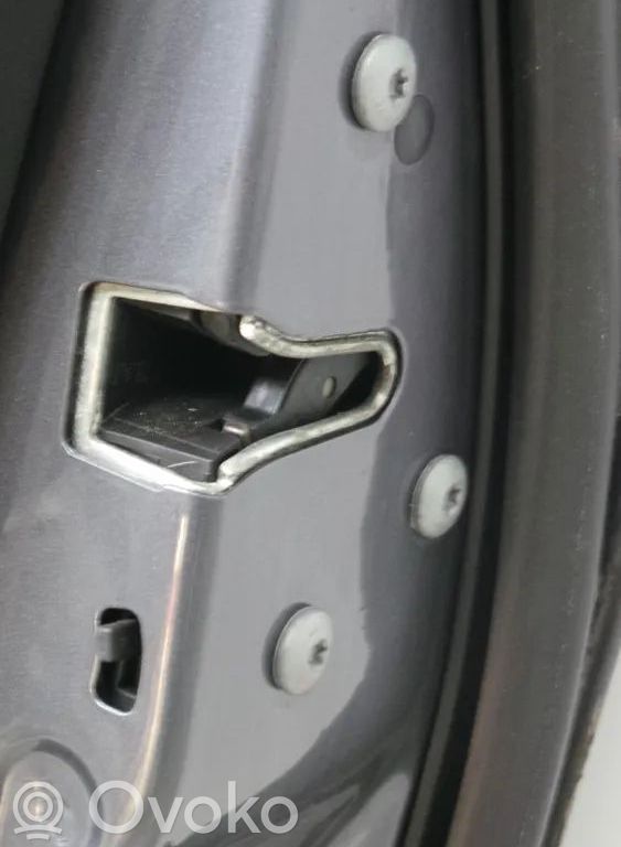 Cerradura de puerta trasera