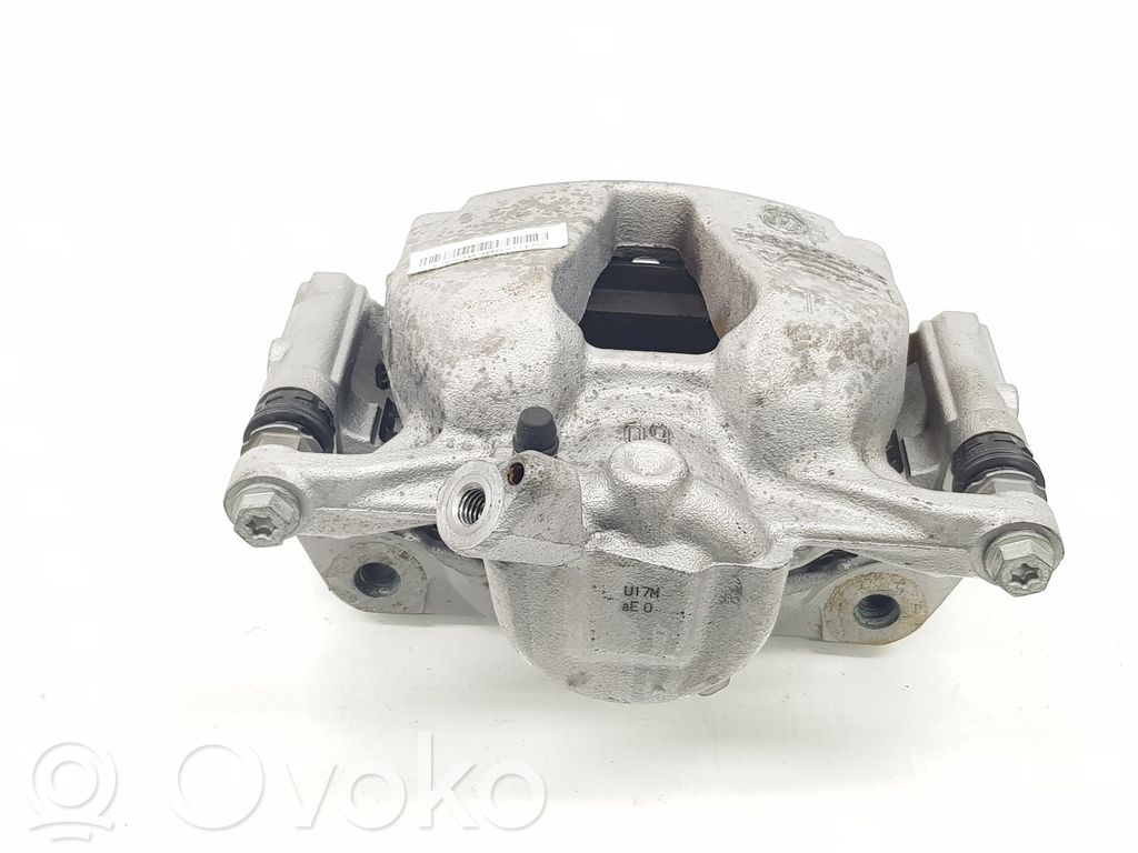 Opel Astra L Zacisk hamulcowy przedni 