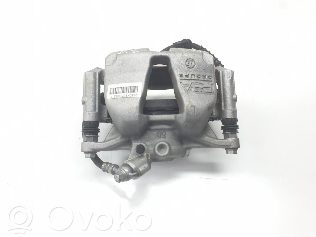 Opel Astra L Zacisk hamulcowy przedni 