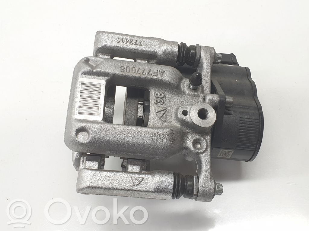 Opel Astra L Tylny zacisk hamulcowy 