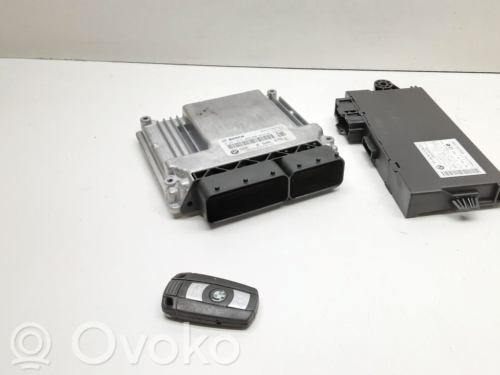 Komputer / Sterownik ECU i komplet kluczy   8506375,0281016,9147226