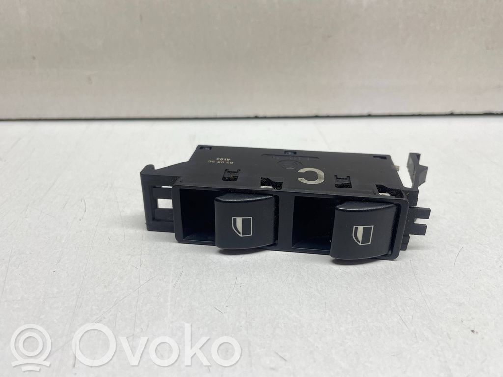 Electric window control switch   6902178