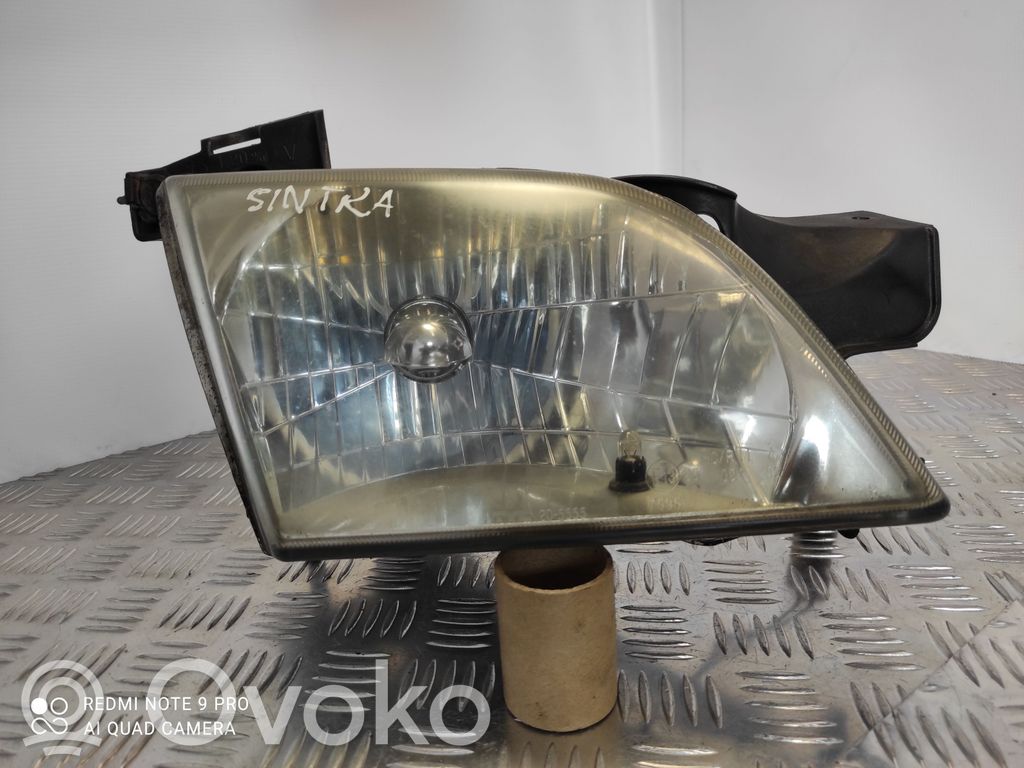 Opel Sintra Lampa przednia 