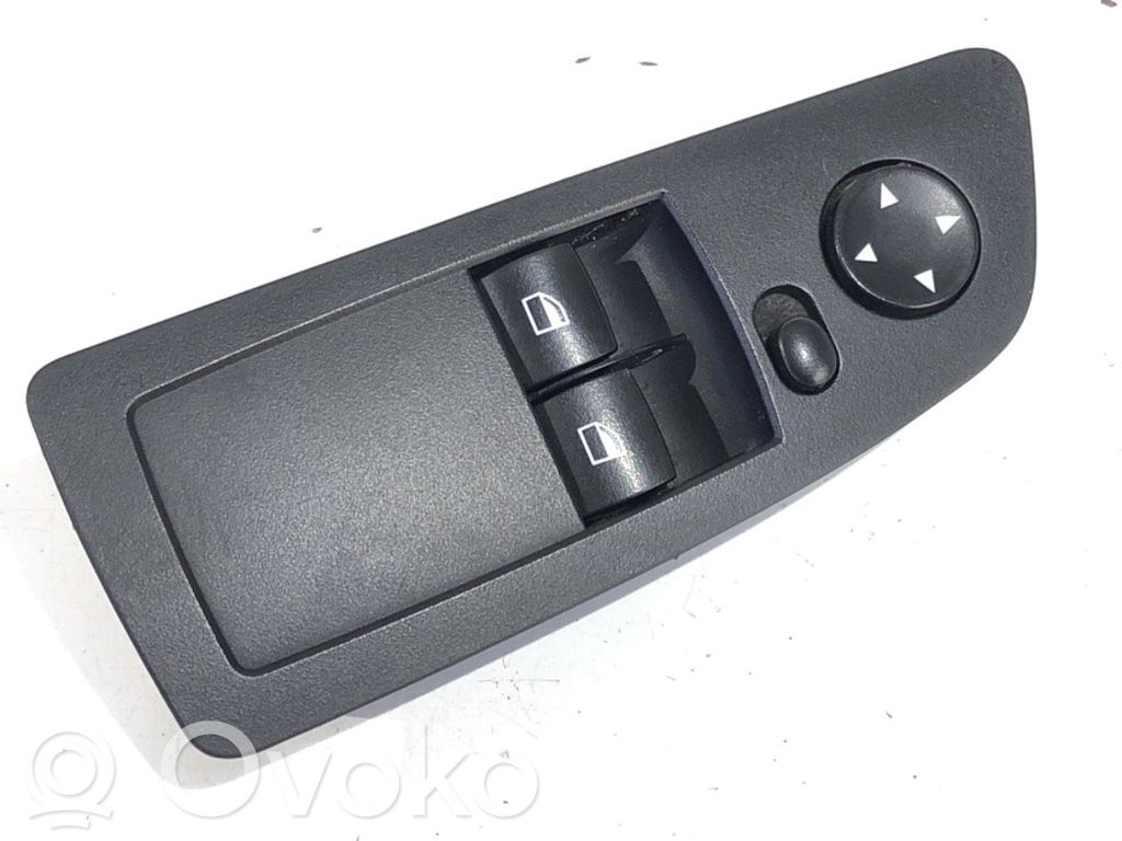 Electric window control switch   6970160