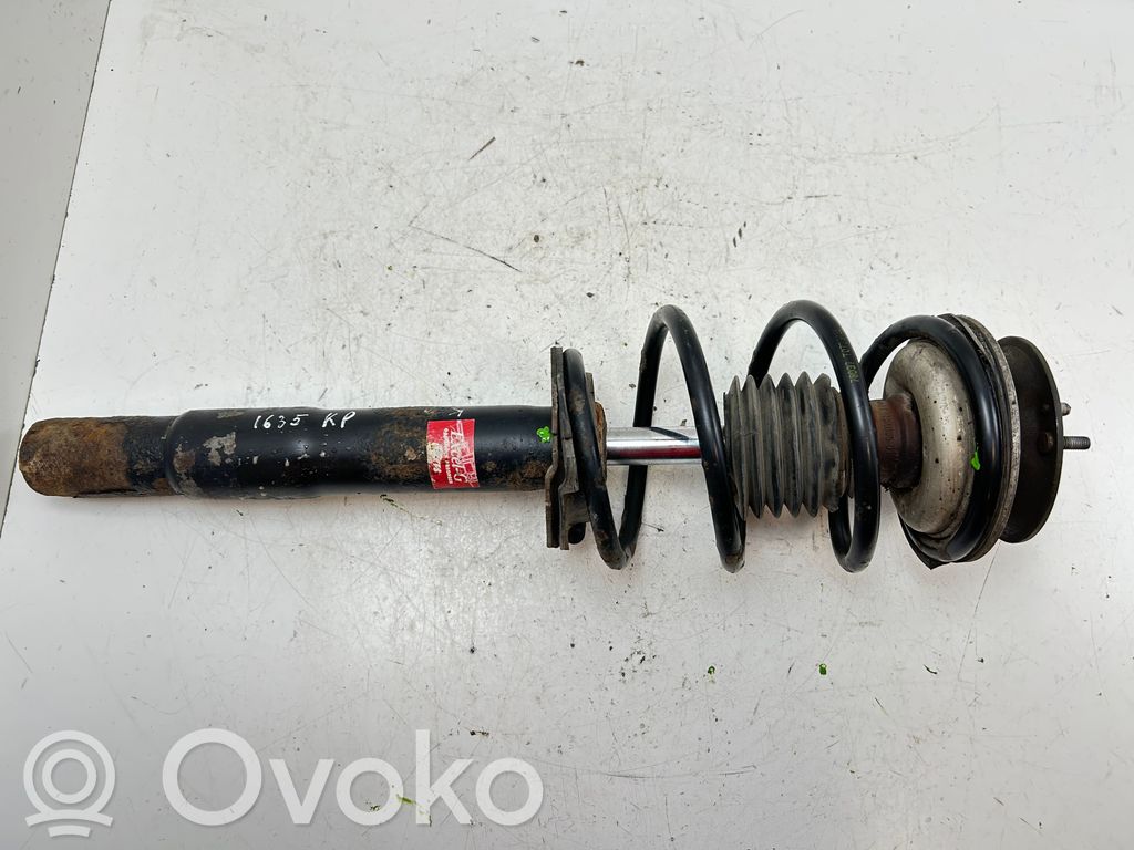Front shock absorber with coil spring   6764085