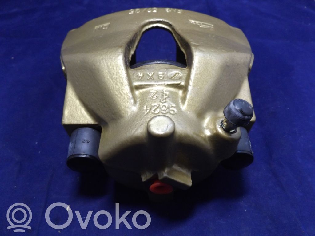 Opel Astra H Zacisk hamulcowy przedni 