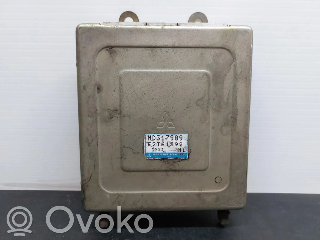 Engine control unit/module   MD317989,E2T61592