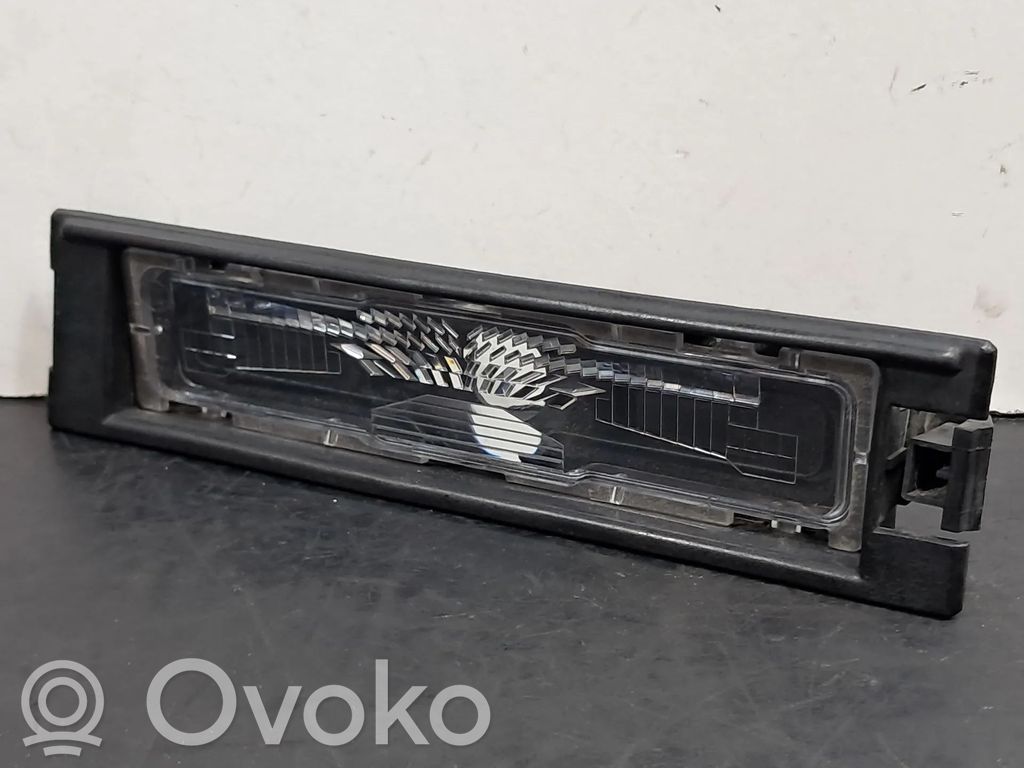 Dacia Spring Éclairage de plaque d'immatriculation 