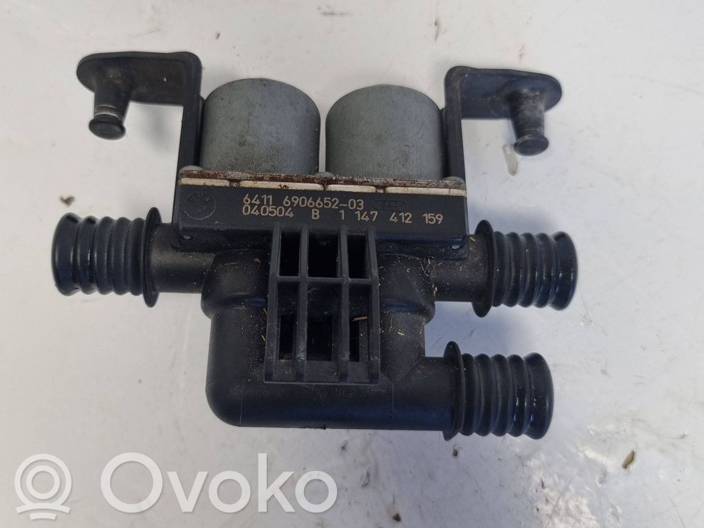 Coolant heater control valve   6906652,1147412159,040504