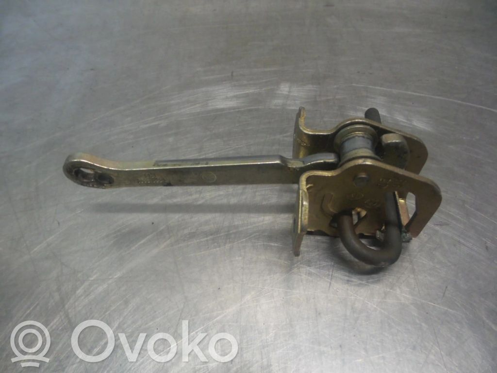 Etuoven lukon laukaisin