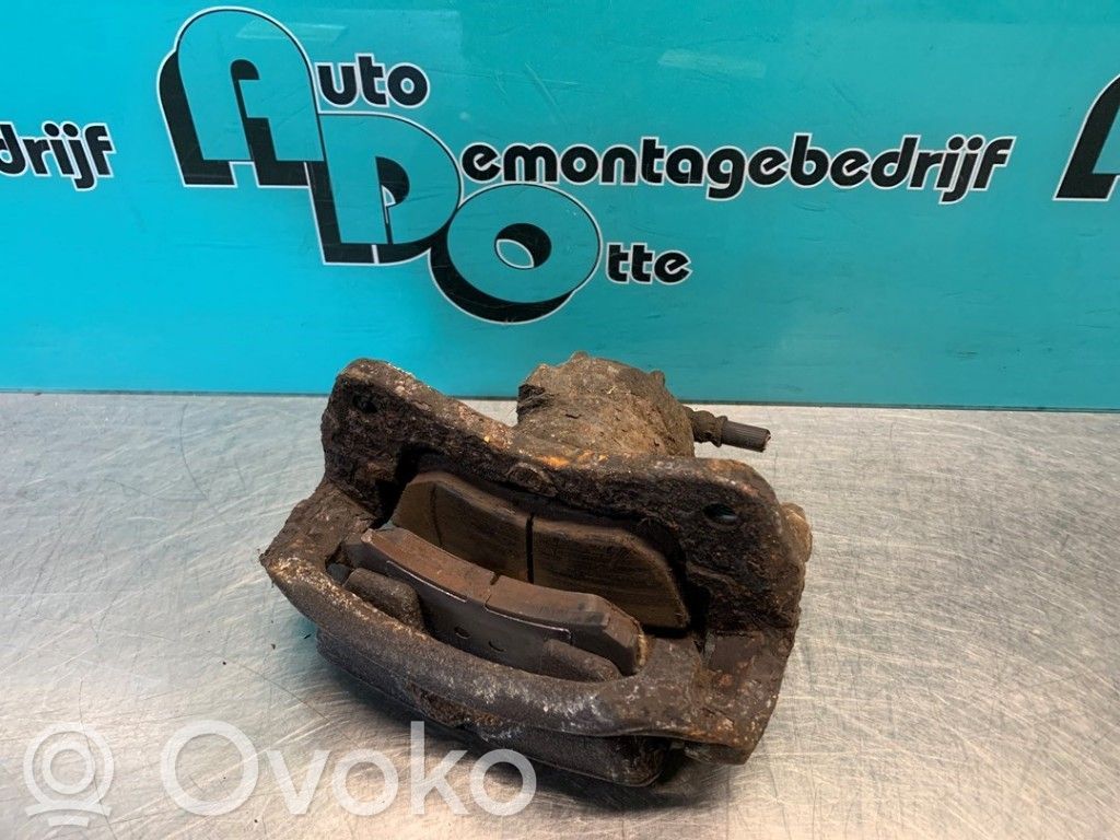 Mitsubishi Colt Zacisk hamulcowy przedni 