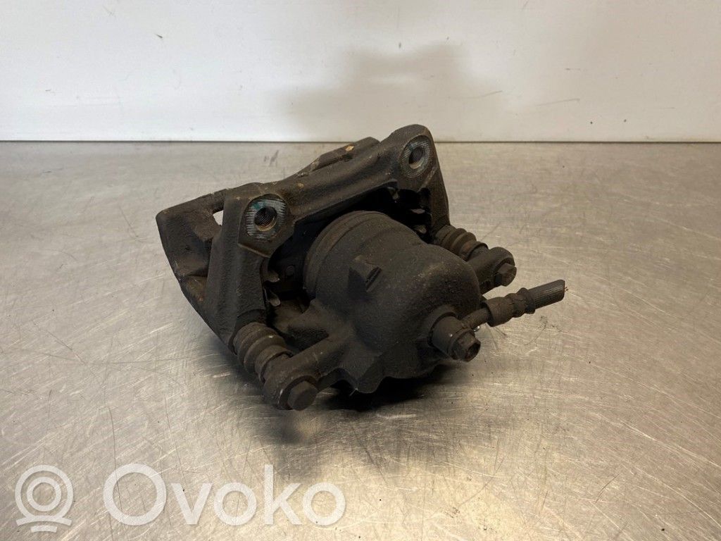 Nissan Note (E12) Front brake caliper 