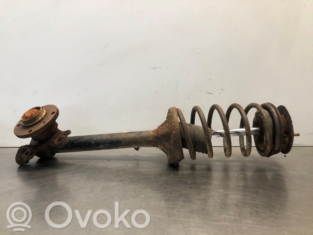 Front shock absorber with coil spring