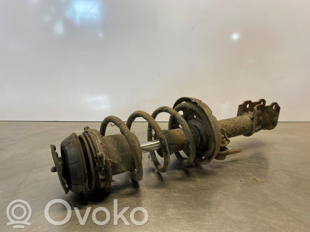 Opel Astra G Amortyzator osi przedniej ze sprężyną 