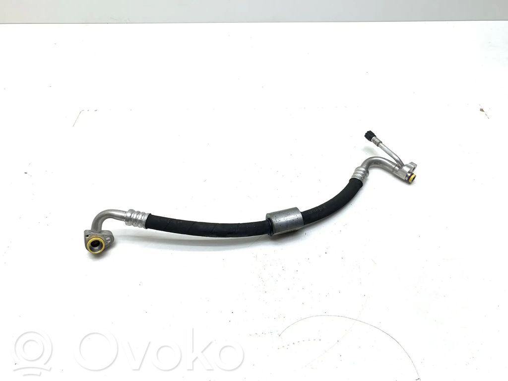 Ilmastointilaitteen putki (A/C)   9209717,52529410,64509209717,AC00100580200K,MGM123