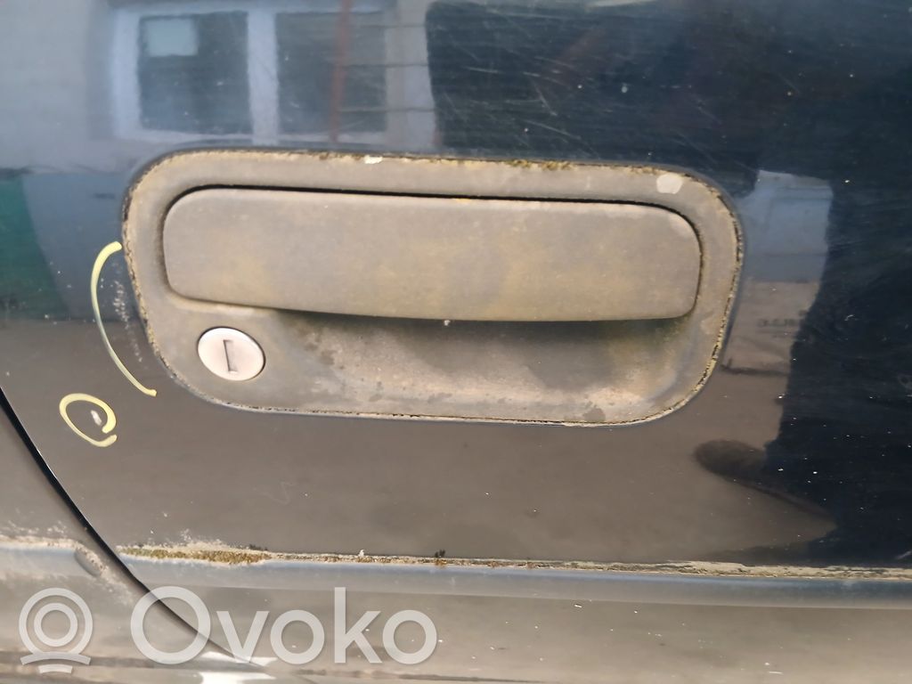 Opel Corsa B Front door exterior handle 