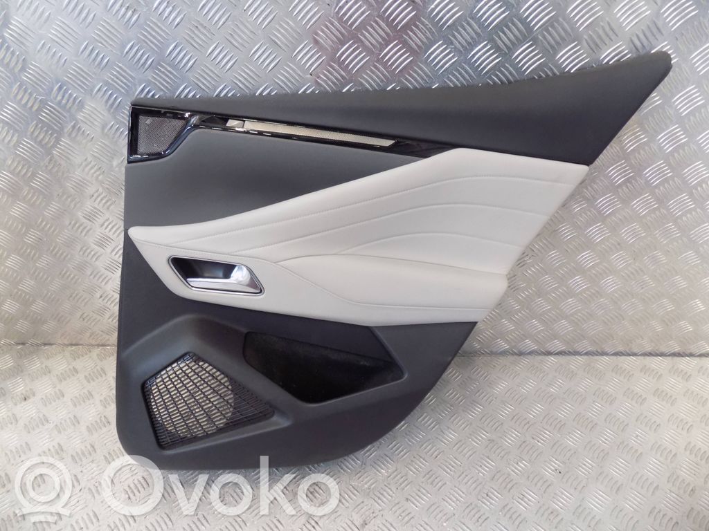 Coupe rear side trim panel