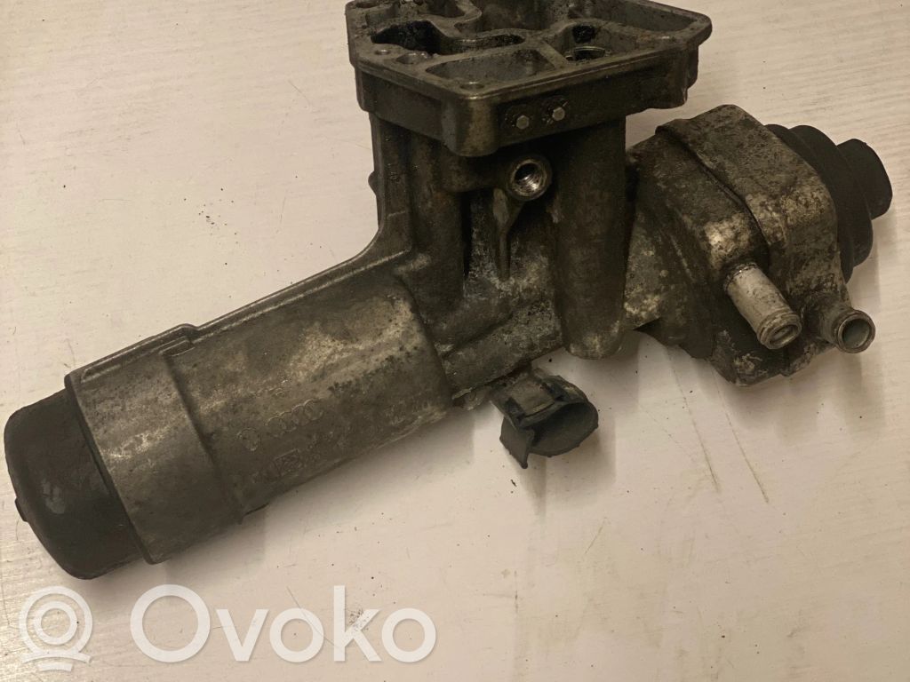 Mocowanie / uchwyt filtra oleju   038115389C,A034T19,038115453,038115387C,038115387D,038115387E,038115387F,038115387K,038115389,038115389B,038115389D