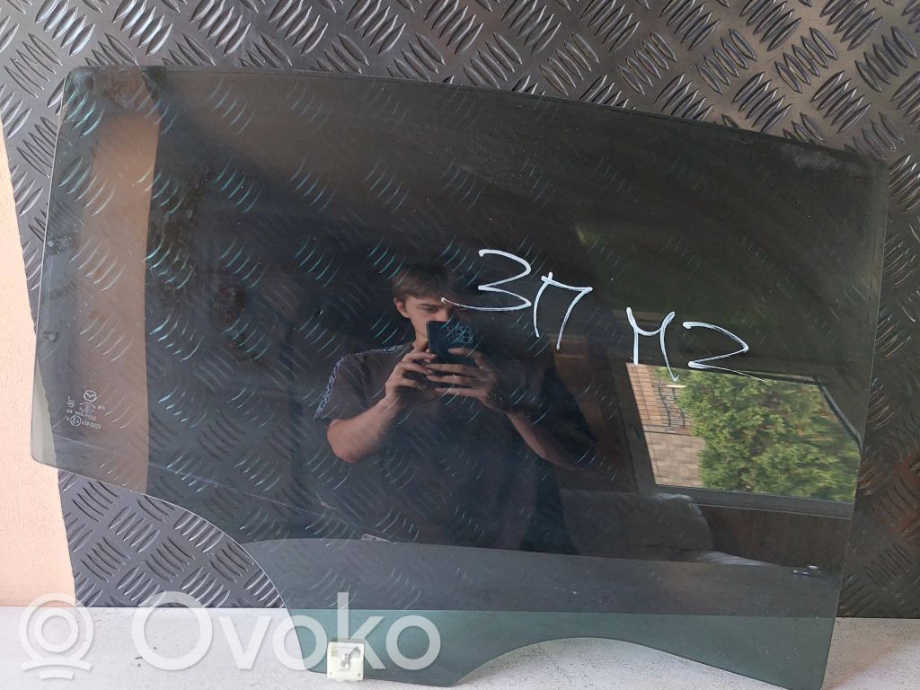 Mazda 6 Rear door window glass 