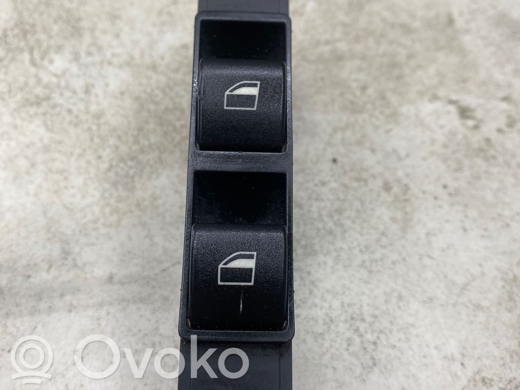 Electric window control switch   6902175